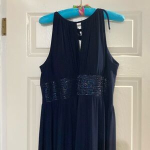 Blue knee length sequined special occasion dress.